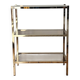 Library shelves in brass and smoked glass