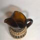 Service old juice carafe and its 9 orange glasses