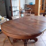 Old table slightly oval cherry tree with central foot with 2 extensions