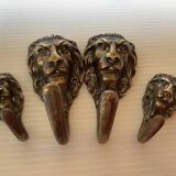 4 lion coat hooks in brass