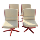 Set of 4 vintage 1970s swivel chairs in red and beige.