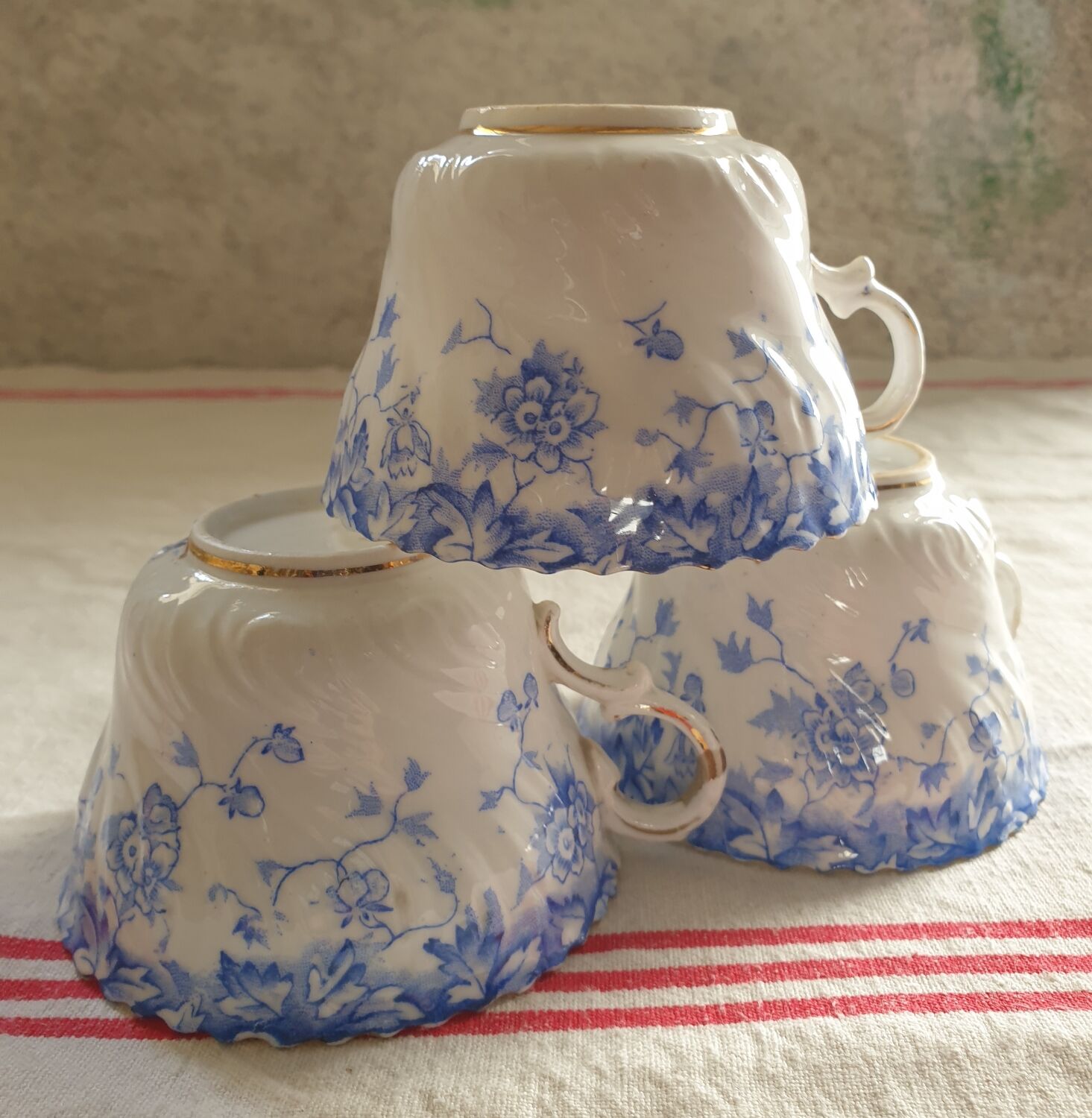 Trio of fine porcelain cups