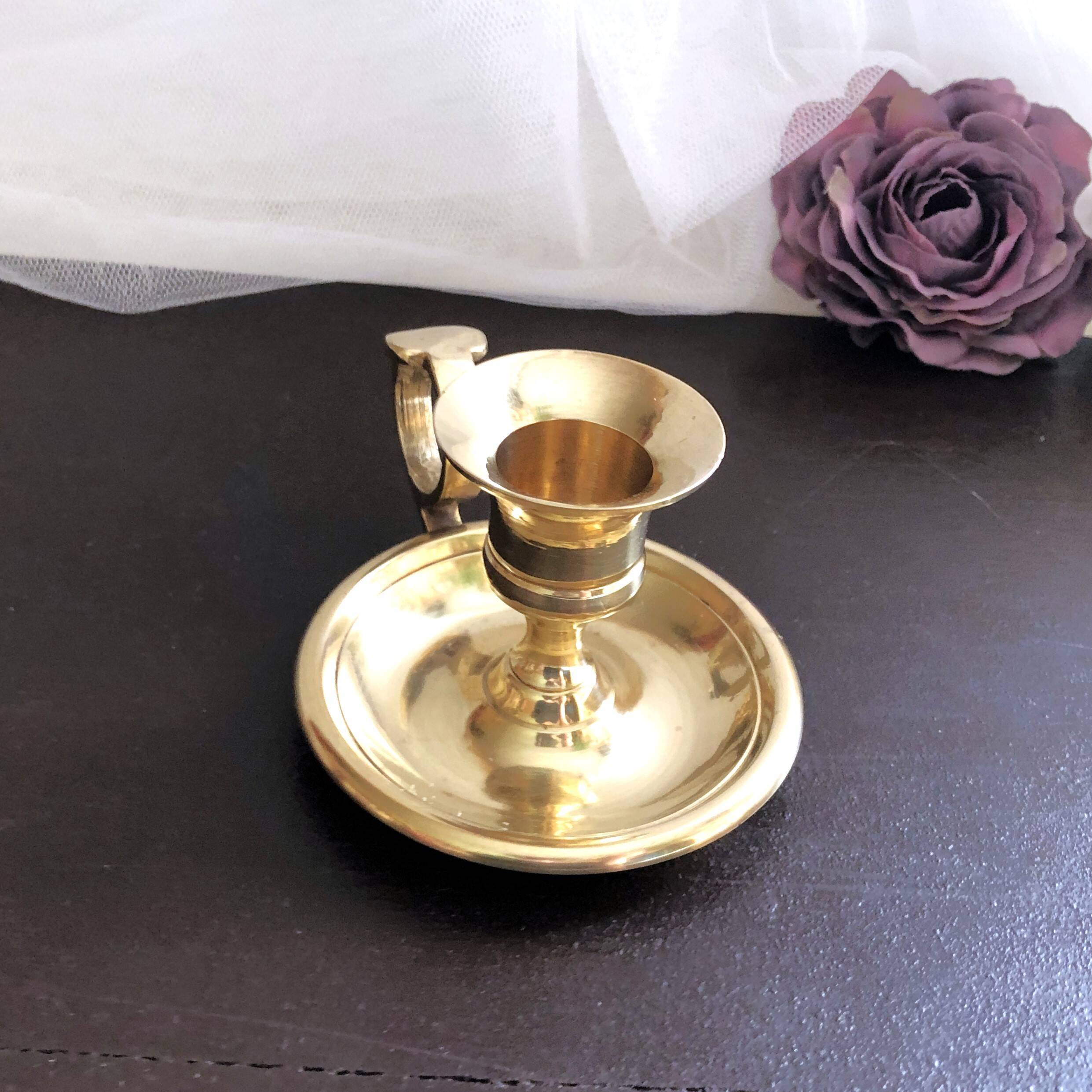 Hand candle holder called "Cave Rat" vintage golden brass