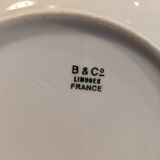 Set of vintage hollow plates in white and gilded Limoges porcelain