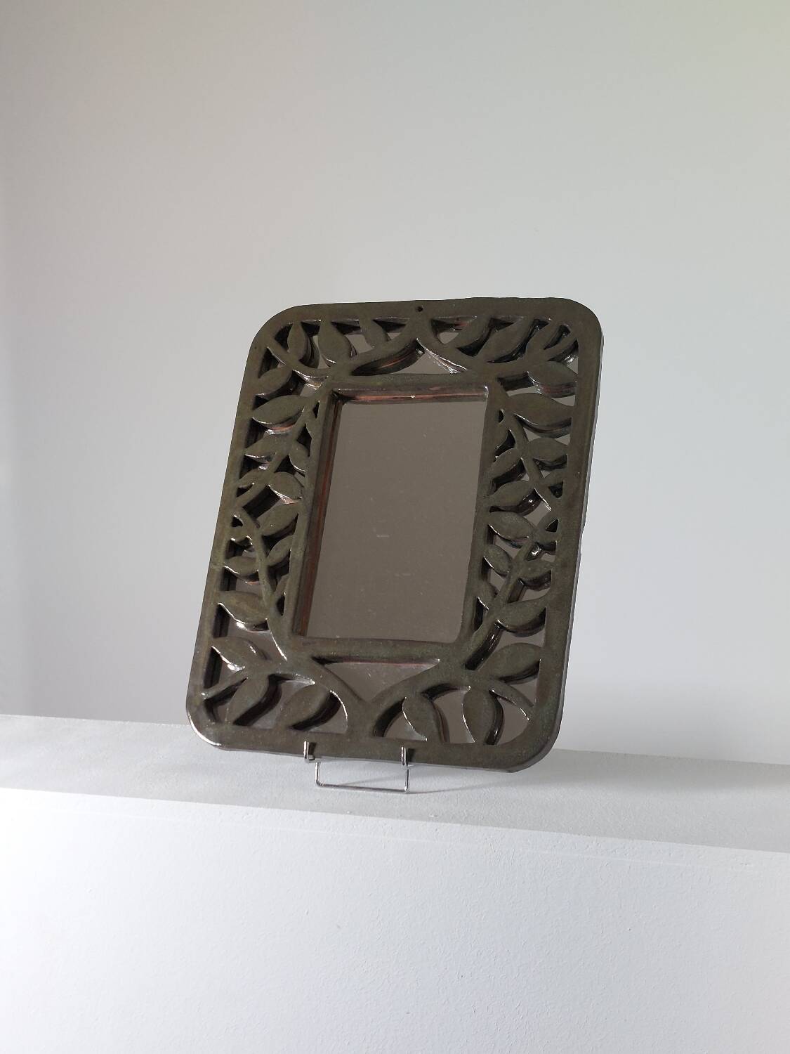 Unique vintage floral ceramic wall mirror by an artist