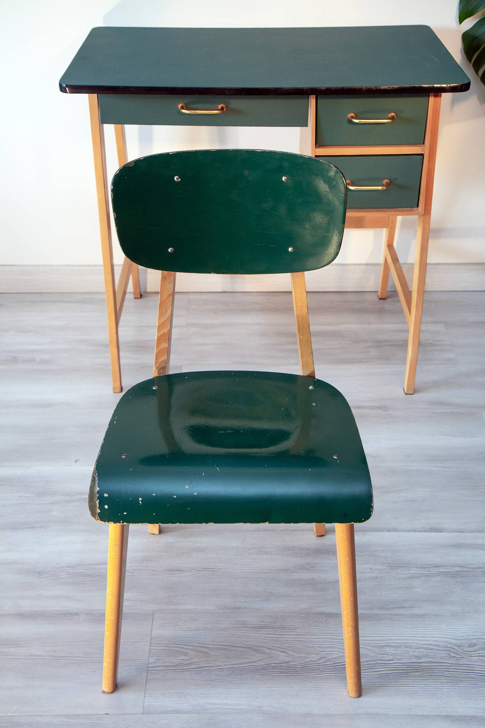 Desk and its green and wood chair, 1950s