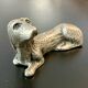12 old dog-shaped Etains du Manoir knife holders