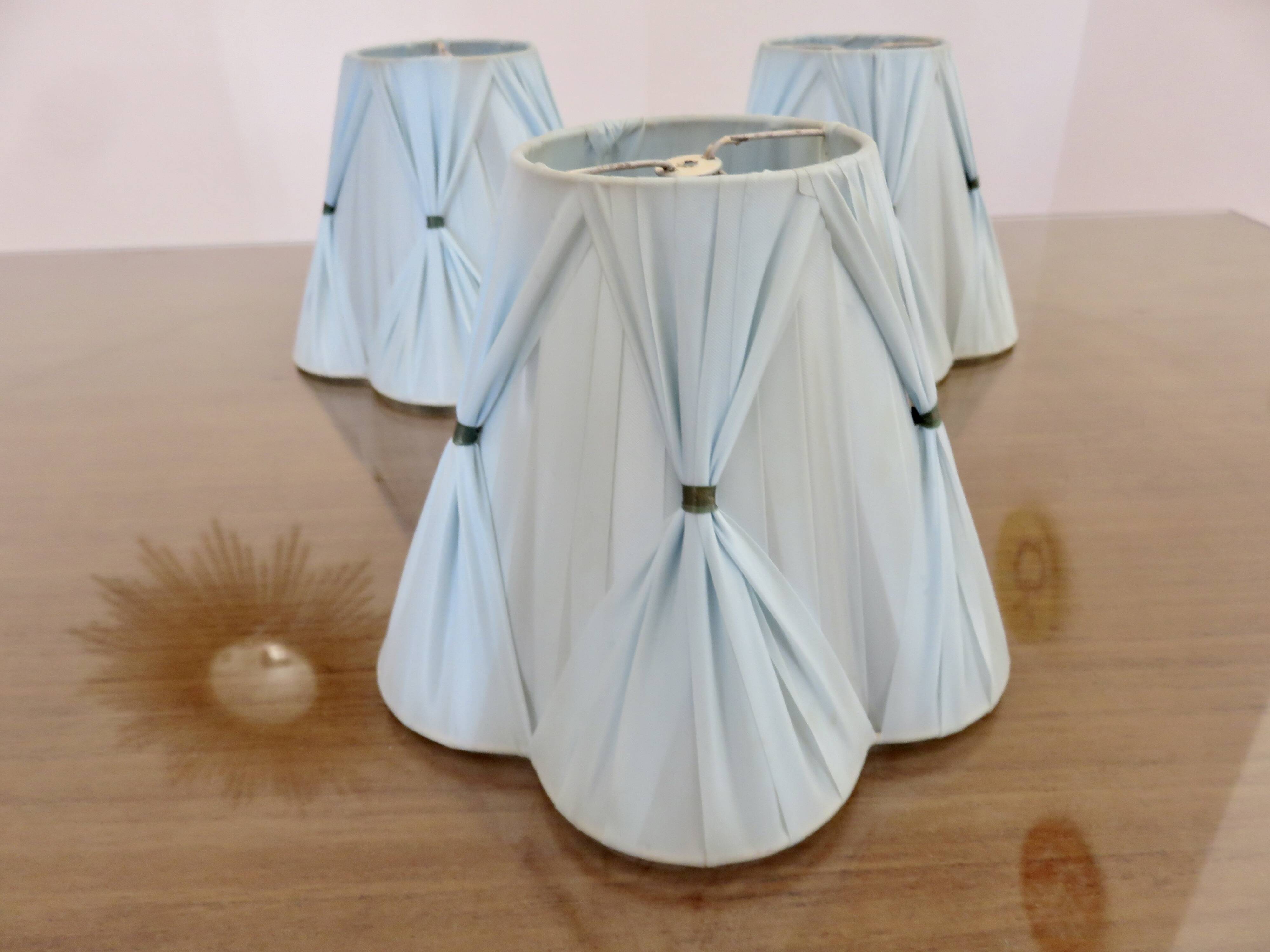 Set of 3 pale blue plastic strip lampshades, to clip onto a bulb.