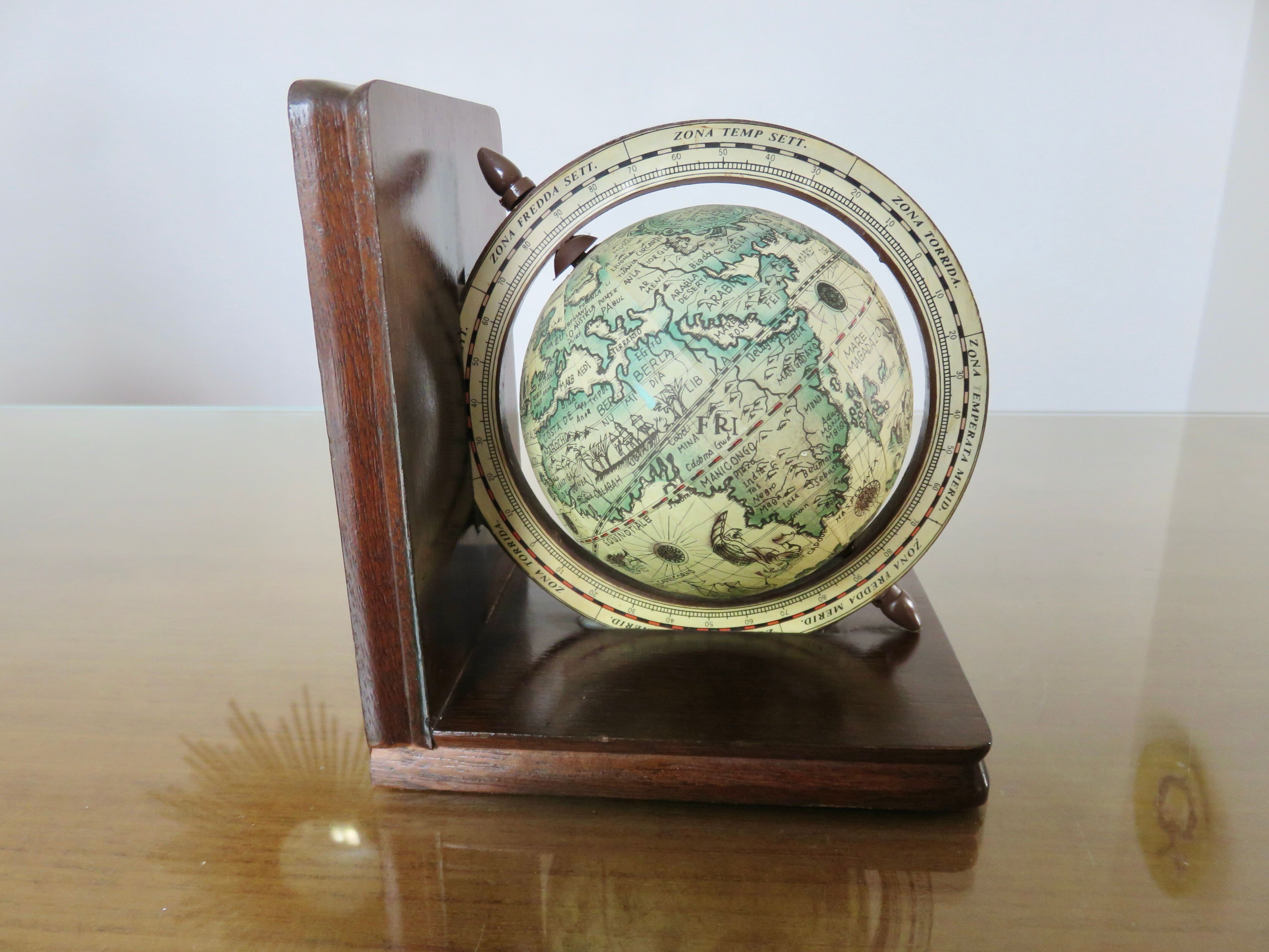 Pair of wooden bookends "globe" from the 1970s.