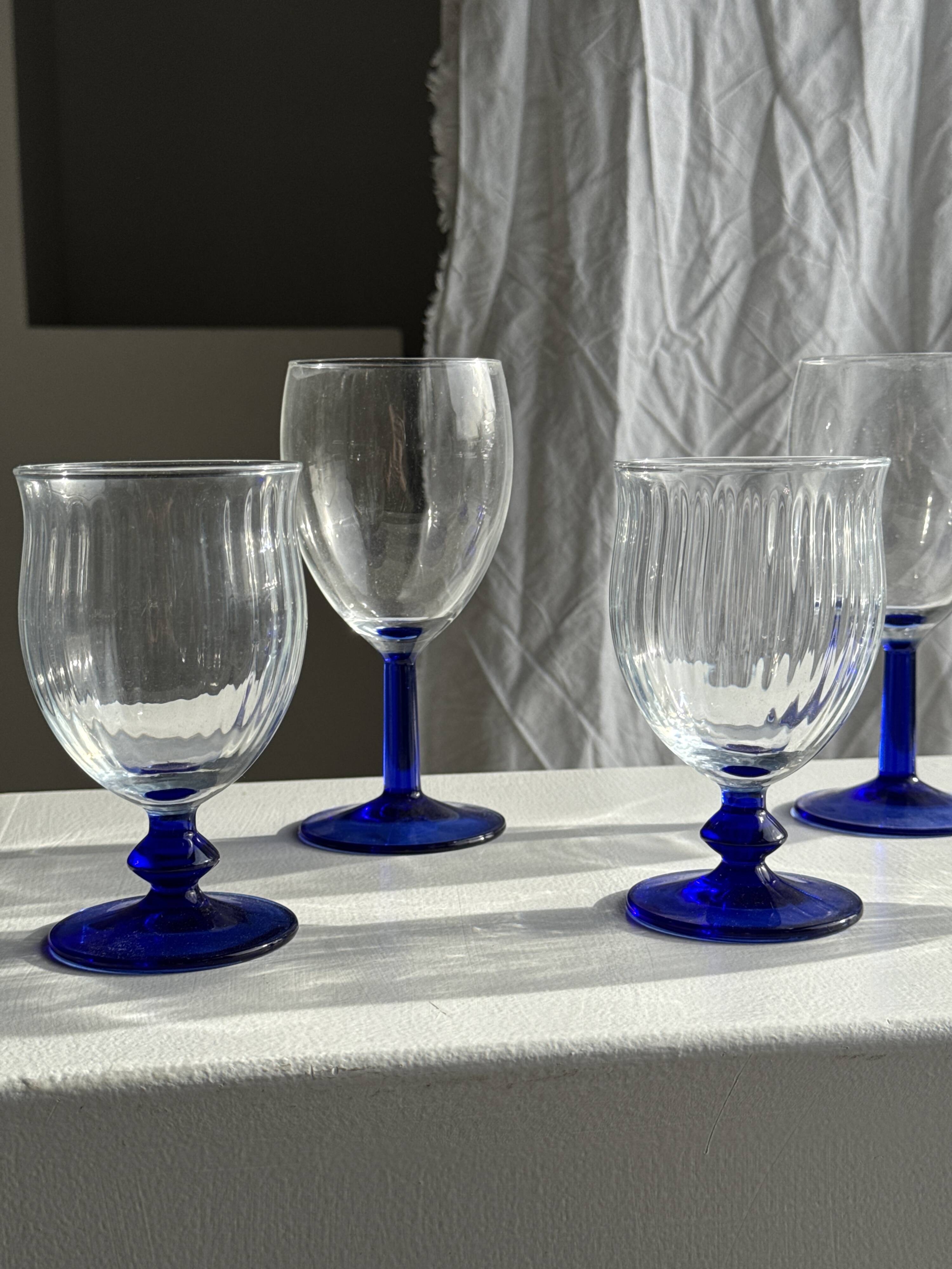 Set of 3 large blue stemmed glasses and 3 small blue stemmed glasses