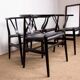4 Danish chairs, black lacquered wood and leather, Wishbone model, Hans Wegner