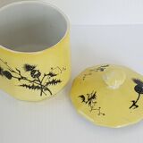 A yellow Art Deco ceramic tobacco service decorated with thistles from the 1920s to 1930s.