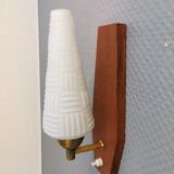 Danish wall lights from the 1970s, made of milky white glass shades, teak wood suspension and brass.