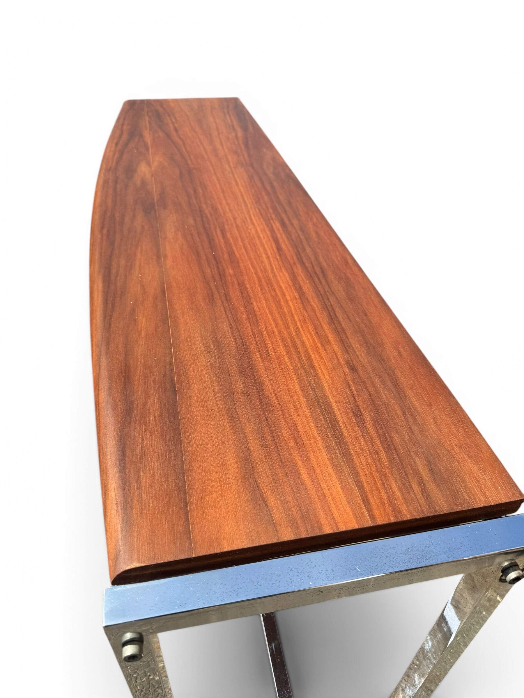 Curved base console in Scandinavian design – mahogany and chrome