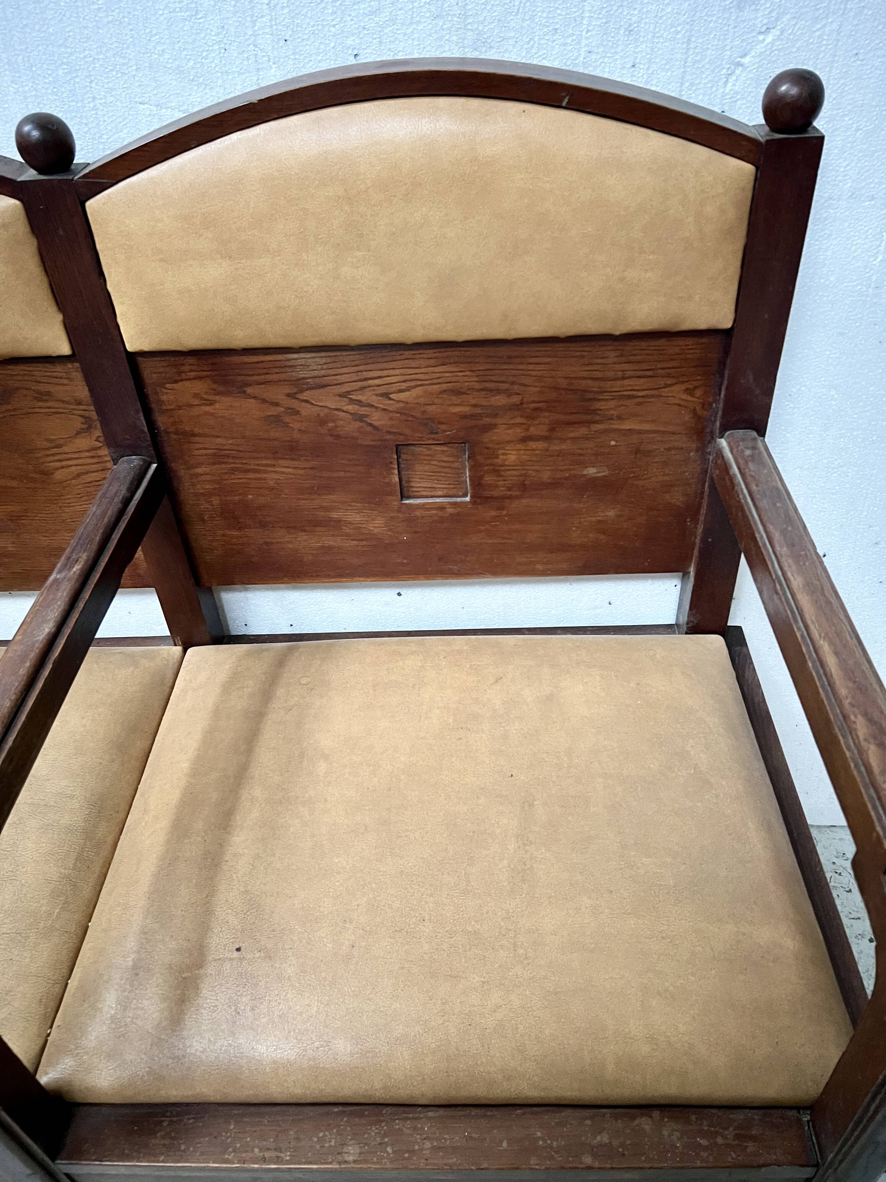 Art Deco two-seater bench in solid mahogany, 20th century.