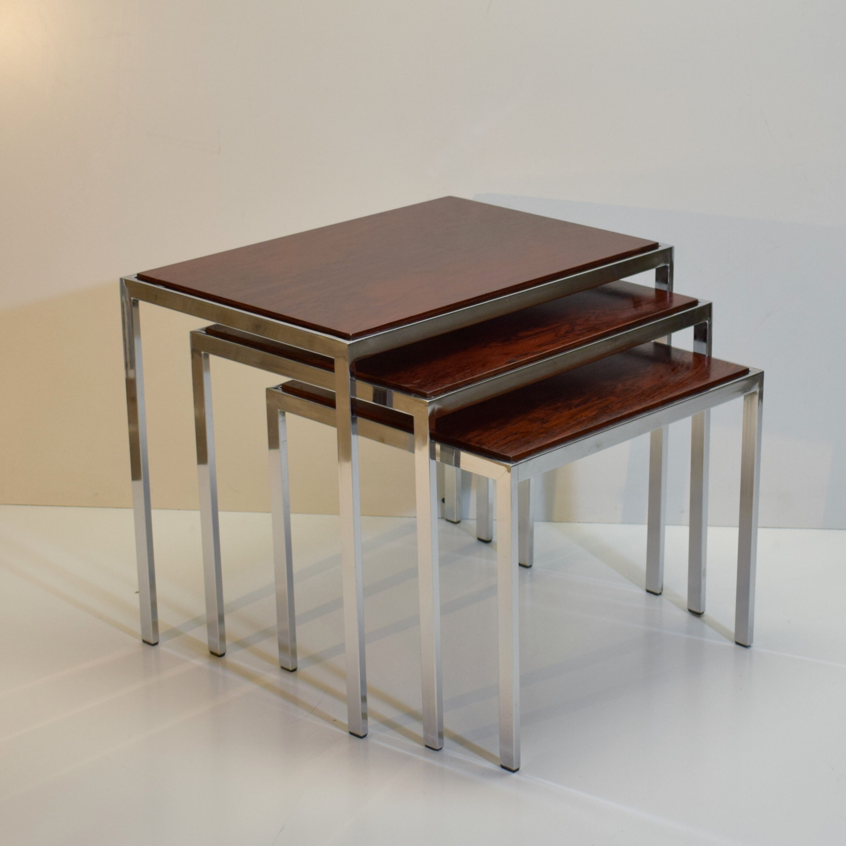 Vintage rosewood and chrome tables with reversible trays