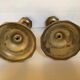 Four brass candle holders