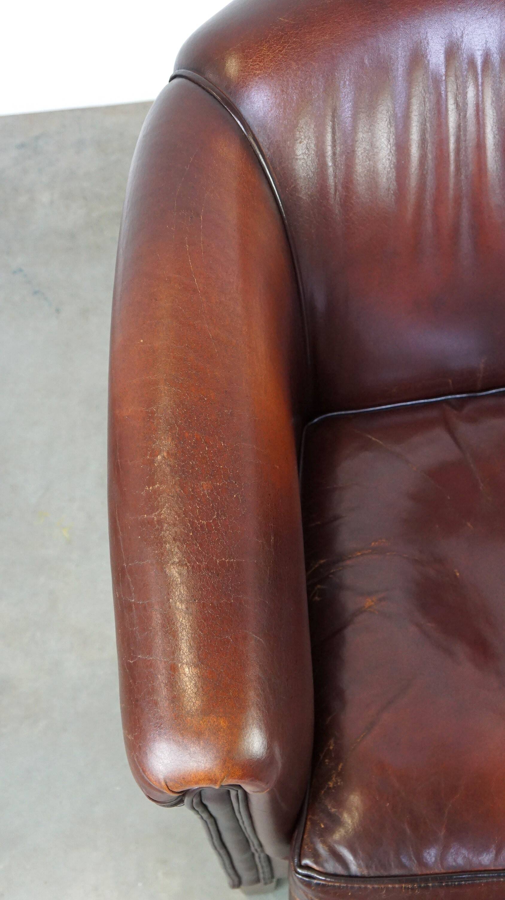 Nice sheepskin club chair with a beautiful patina
