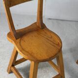 Pair of brutalist wooden back stools. France, circa 1960