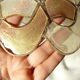 Pair of mother-of-pearl and brass lampshades