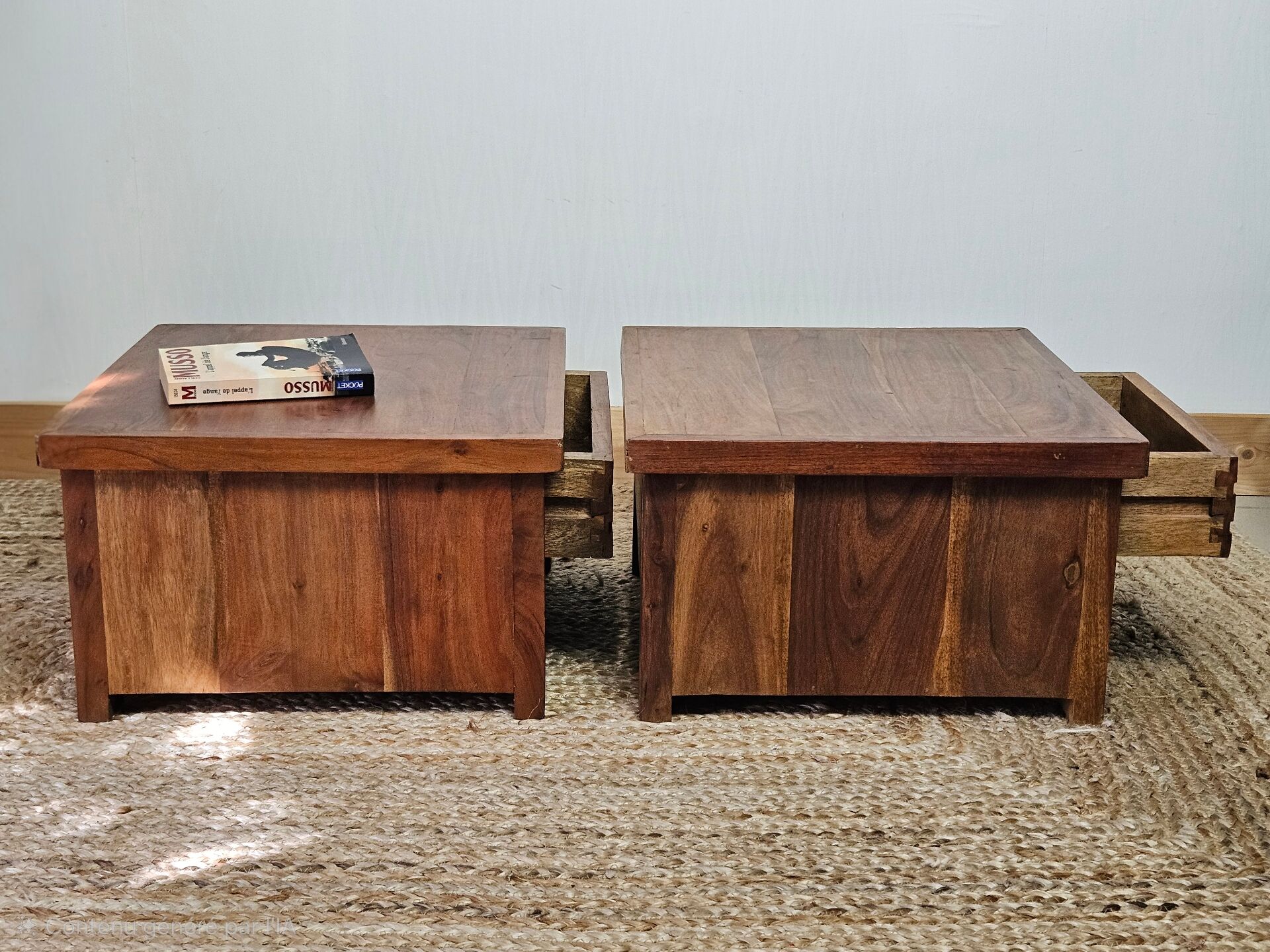 Pair of handcrafted walnut bedside tables from the 20th century.