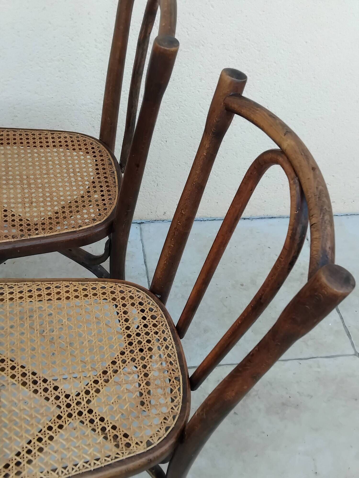 6 antique bistro chairs with curved wood and caning from 1900 L&H Cambier Frères