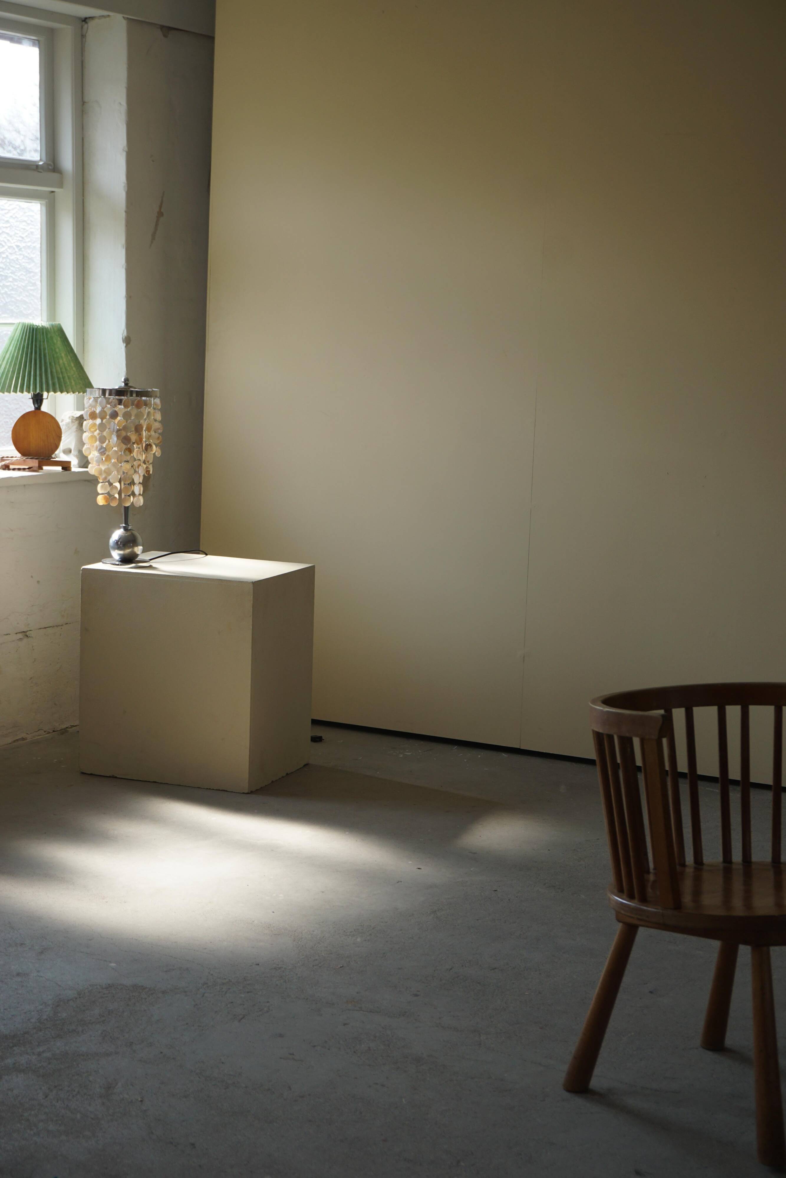 Art Deco table lamp with a mother-of-pearl top and Funkis-style frame.