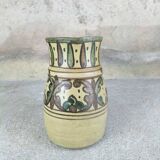 Glazed earthenware pitcher signed Riou.