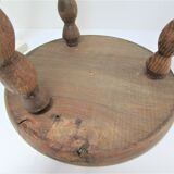 Two vintage tripod solid wood stools