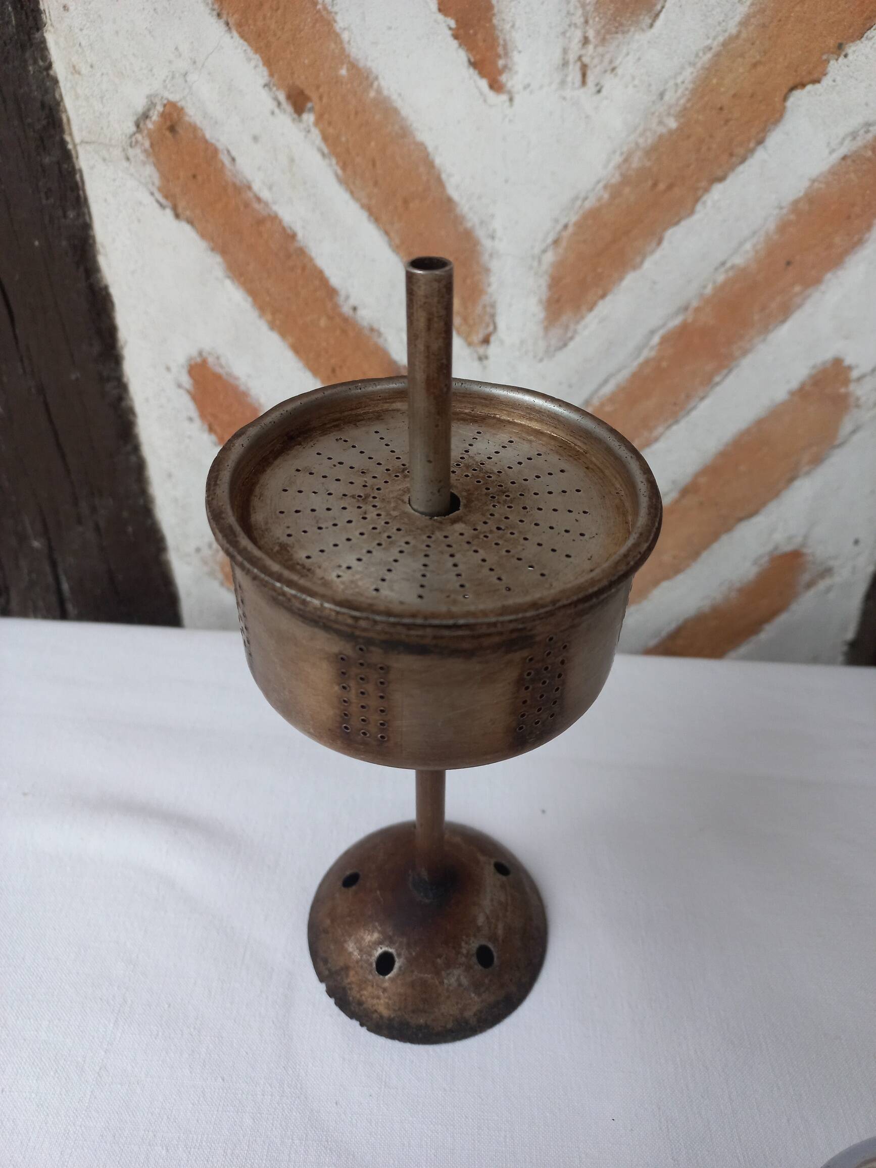 Silver metal coffee maker with glass cap