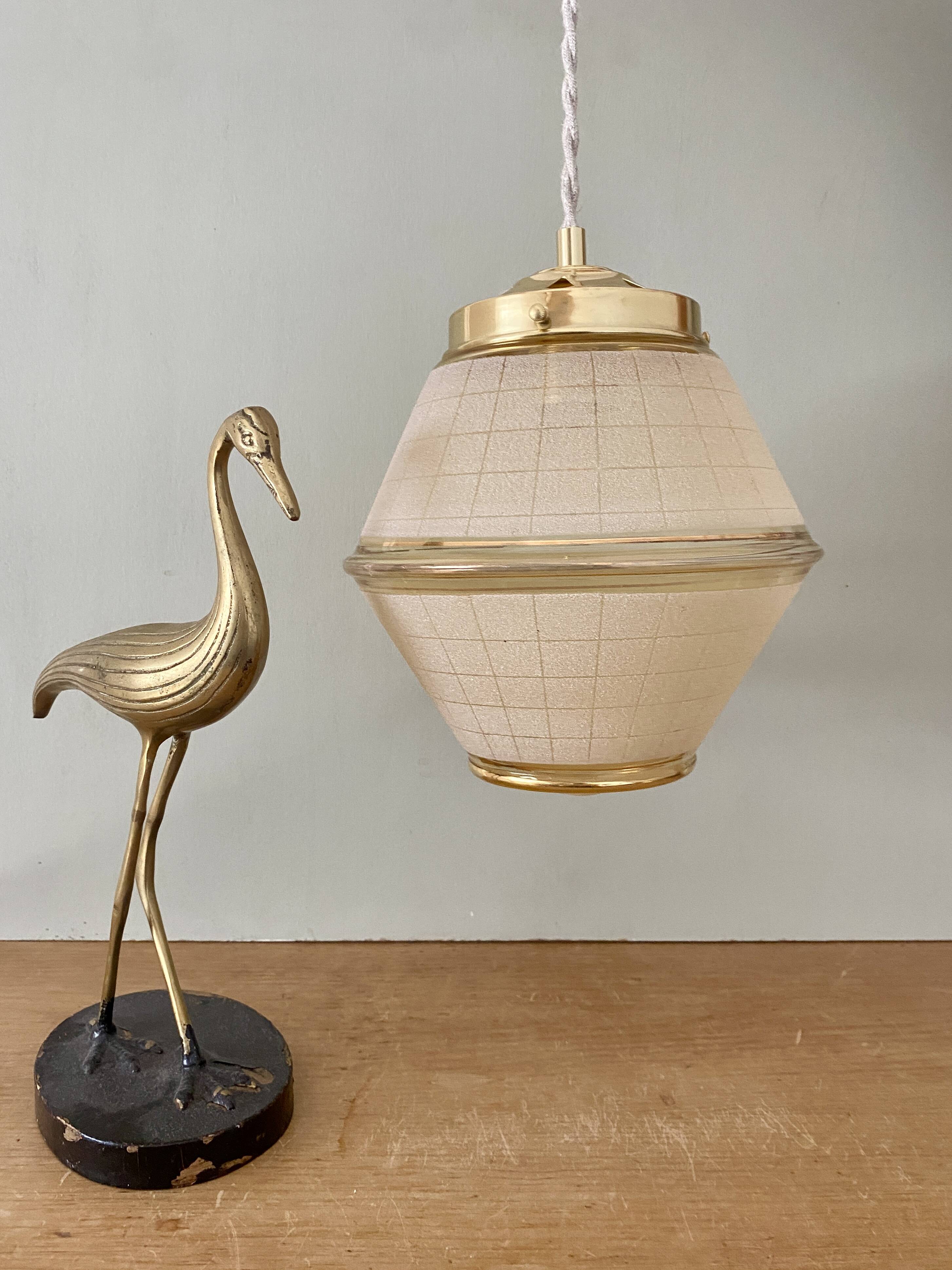 Vintage art deco globe pendant light in yellow and gold granite glass