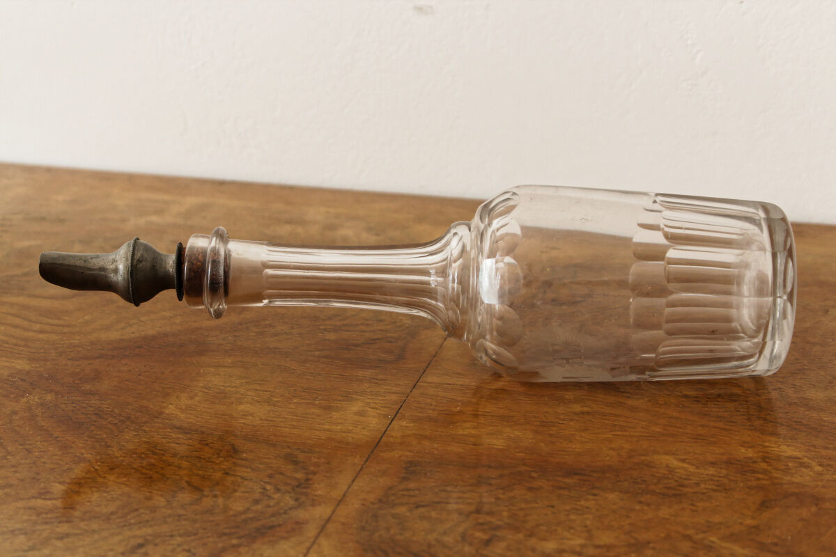 Chiseled glass rum bottle