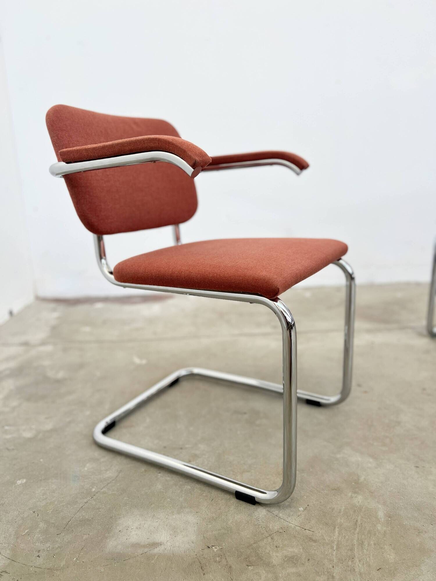 Pair of Marcel Breuer B64 Knoll armchairs in coral fabric