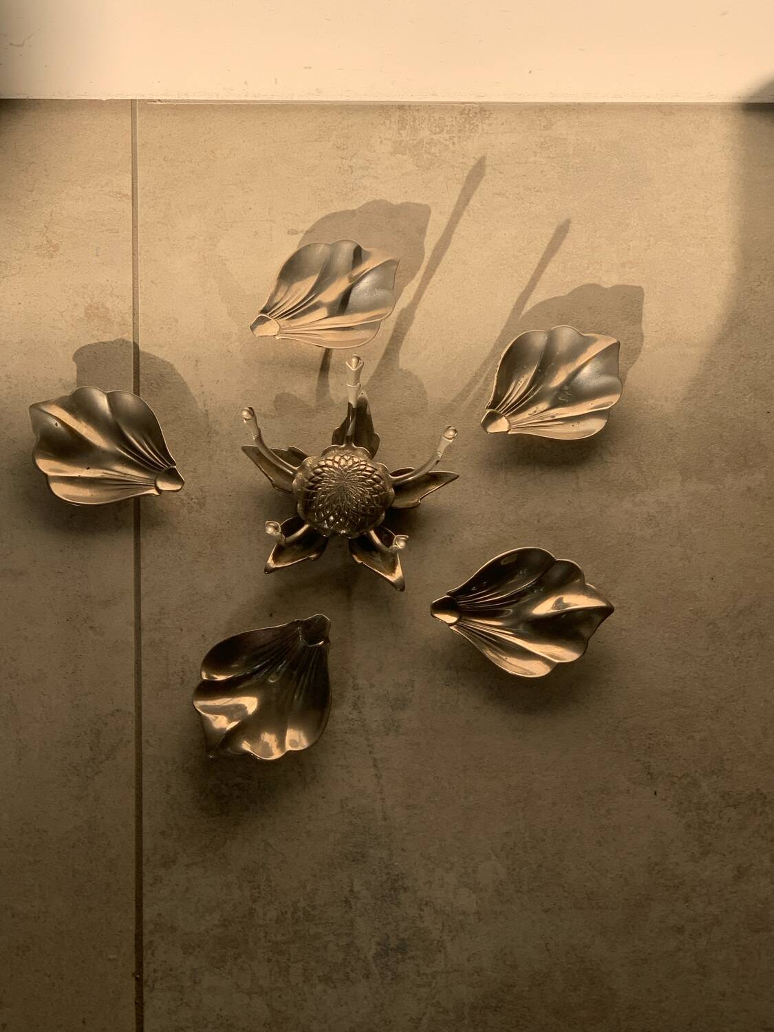 Silver metal flower with removable petals