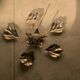 Silver metal flower with removable petals