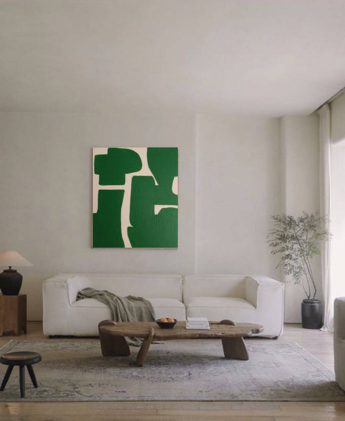 Abstract green art on a beige background.