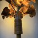 Ornamental floor lamp with "flower" patterns from the 1970s.