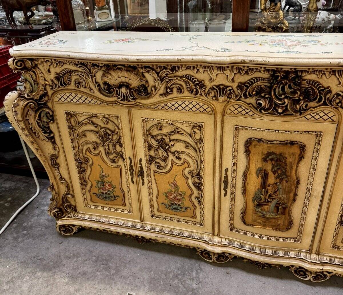 Curved Louis XV Venetian buffet in lacquered, painted, and gilded wood.