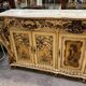 Curved Louis XV Venetian buffet in lacquered, painted, and gilded wood.