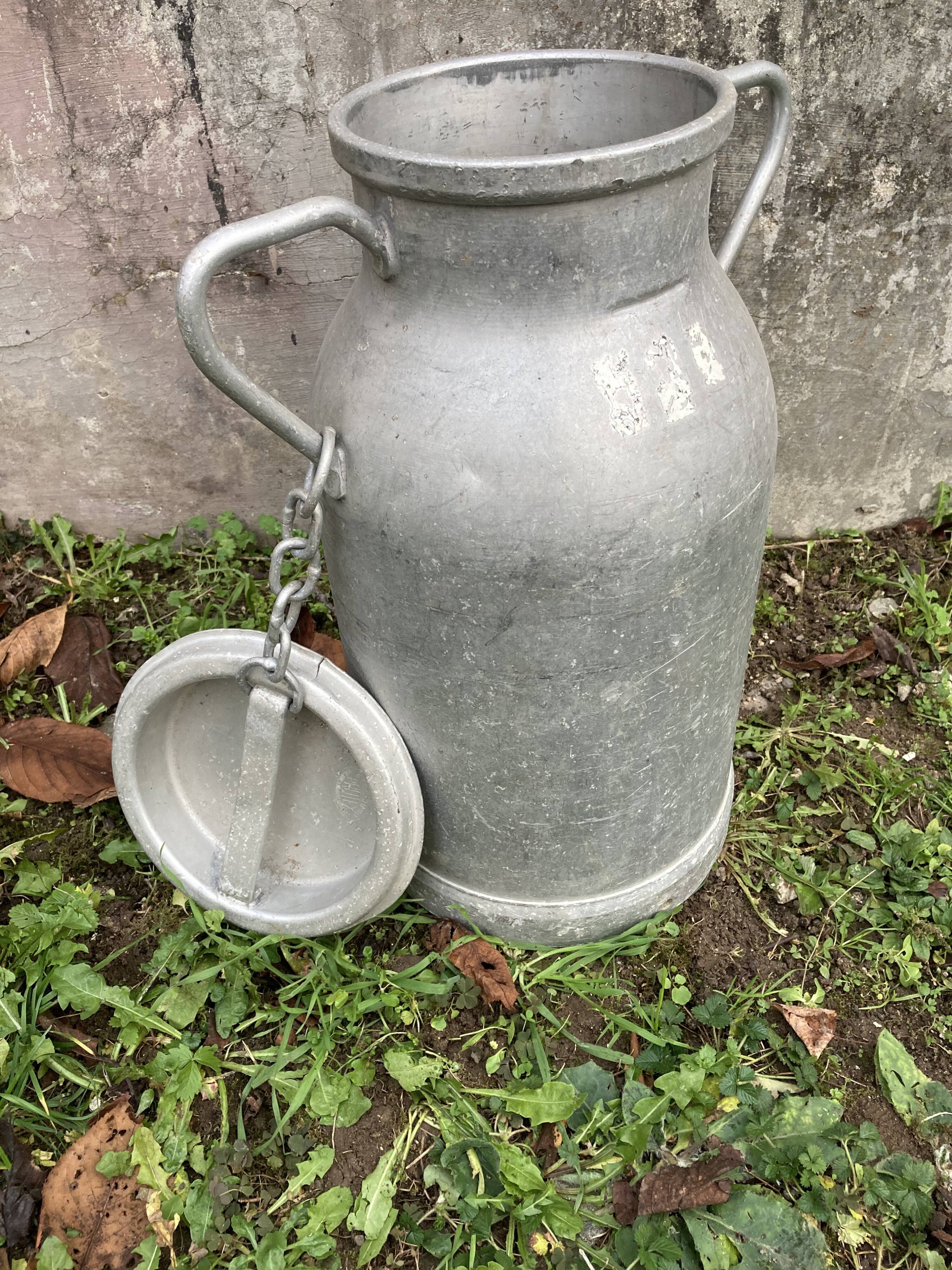 Pair of farm milk jars aluminum cans