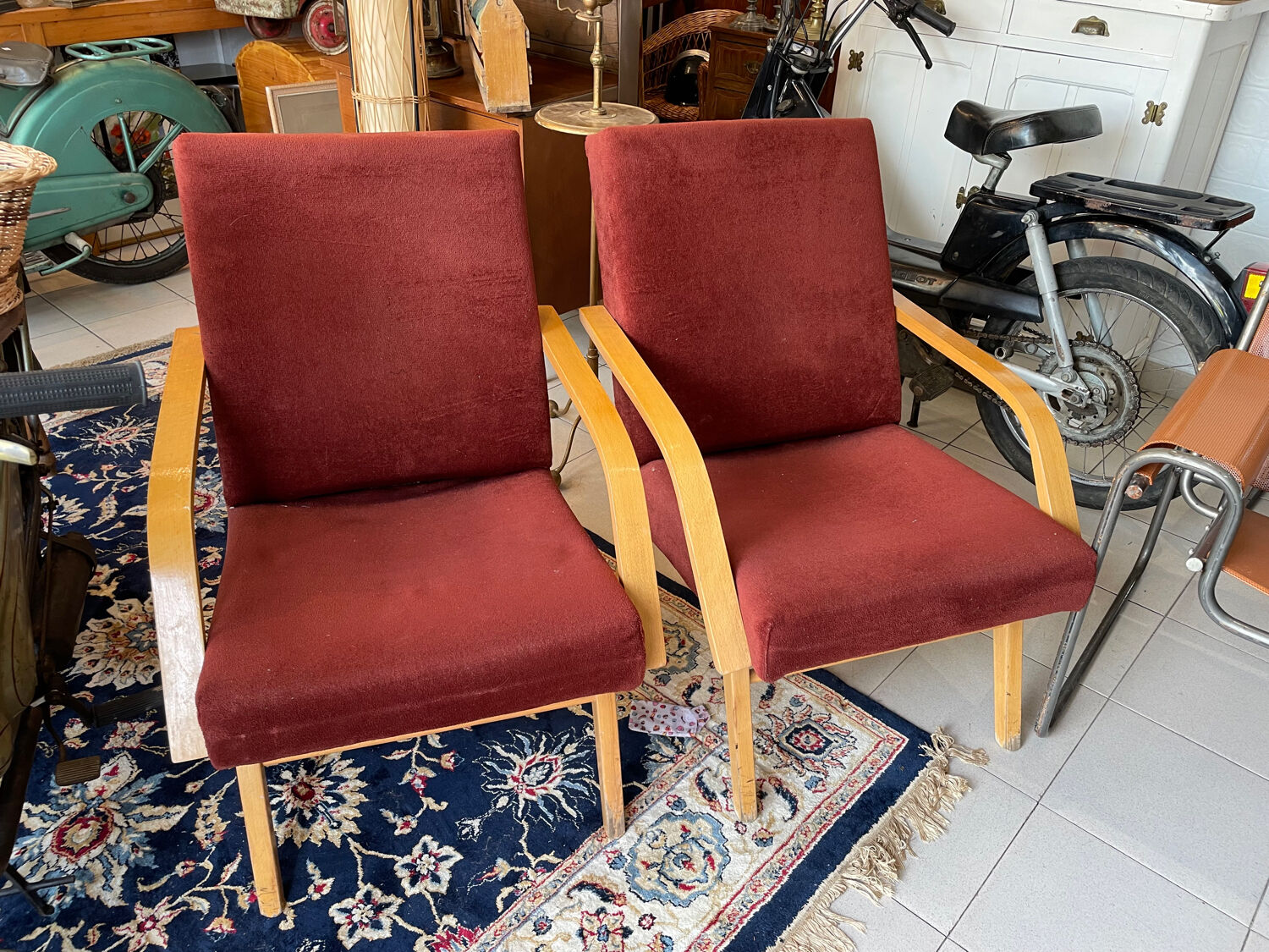 Burgundy Scandinavian armchairs