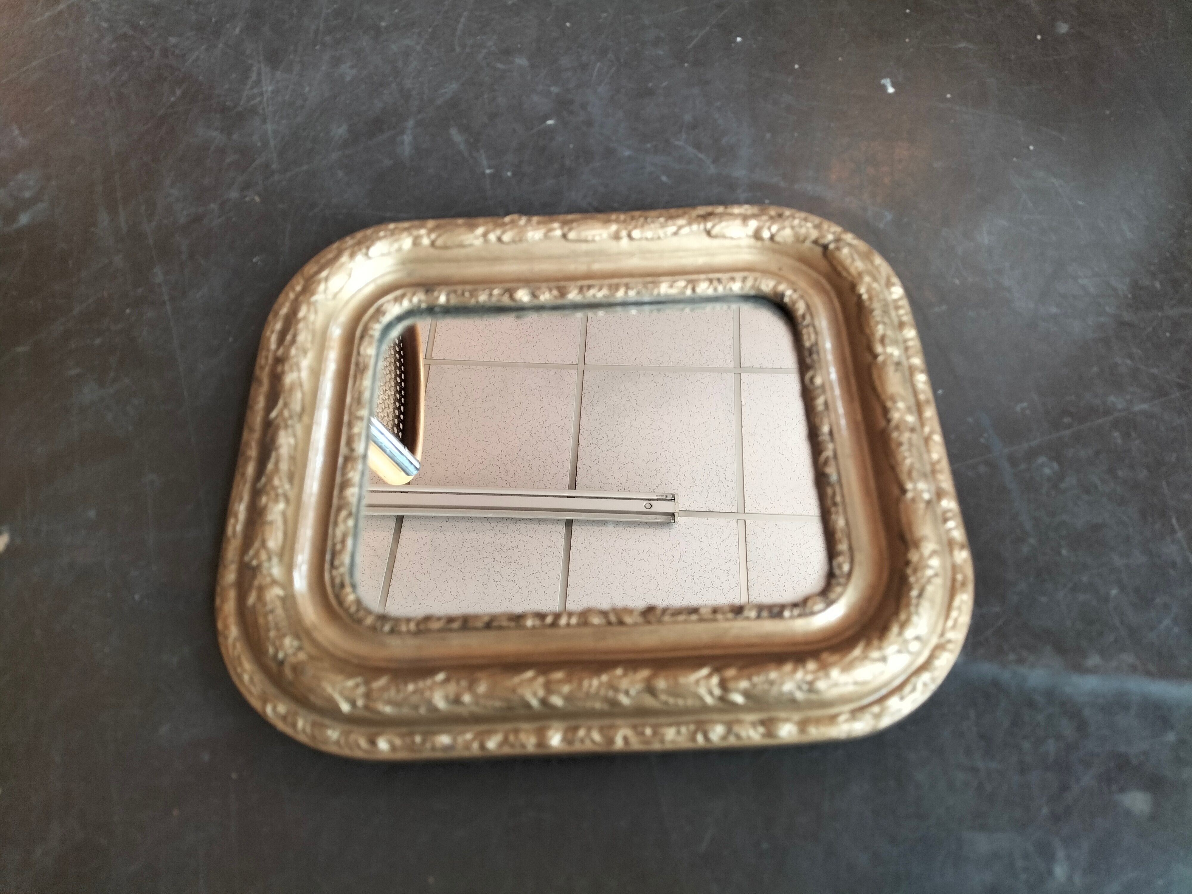 Small old mirror