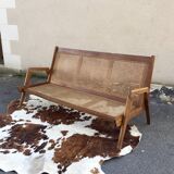 caned teak bench
