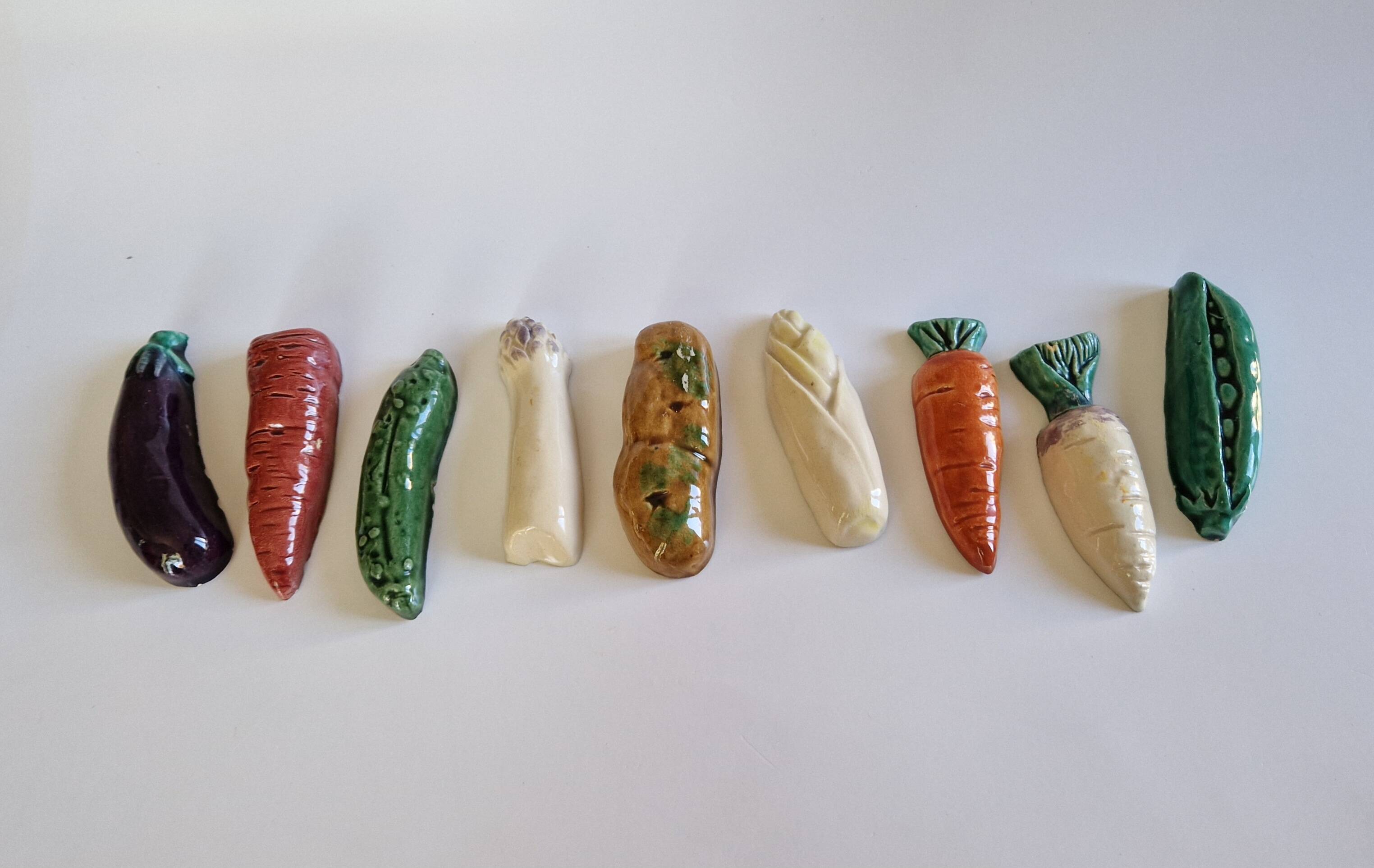 Set of 9 vintage ceramic vegetable knife holders