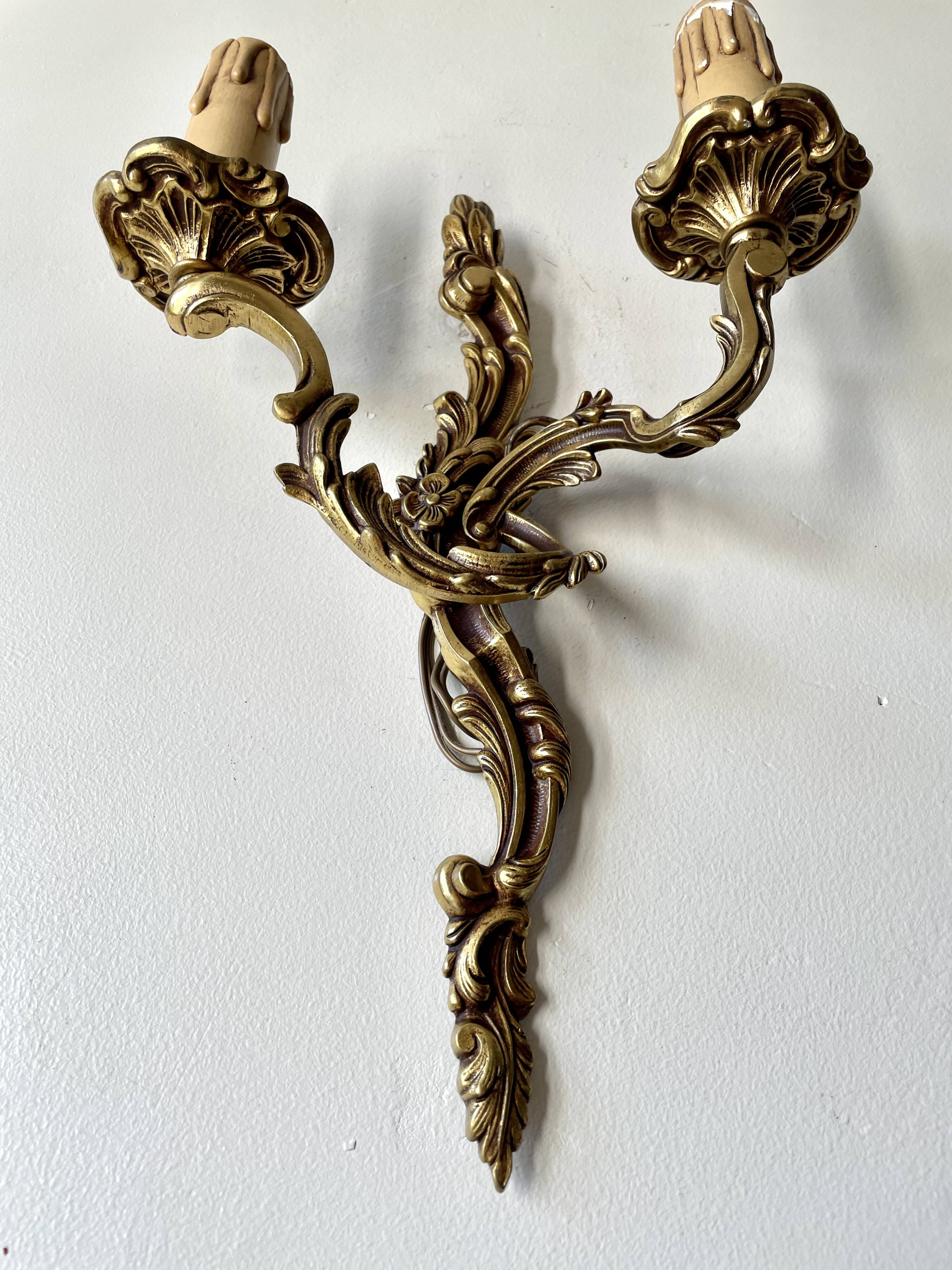 Pair of rocaille bronze wall sconces