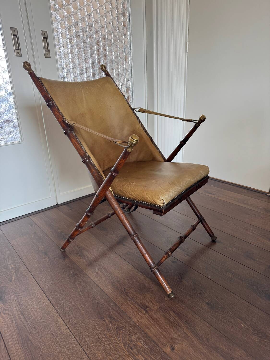 Vintage Faux bamboo, leather campaign folding chair by Maison Jansen, 1950s