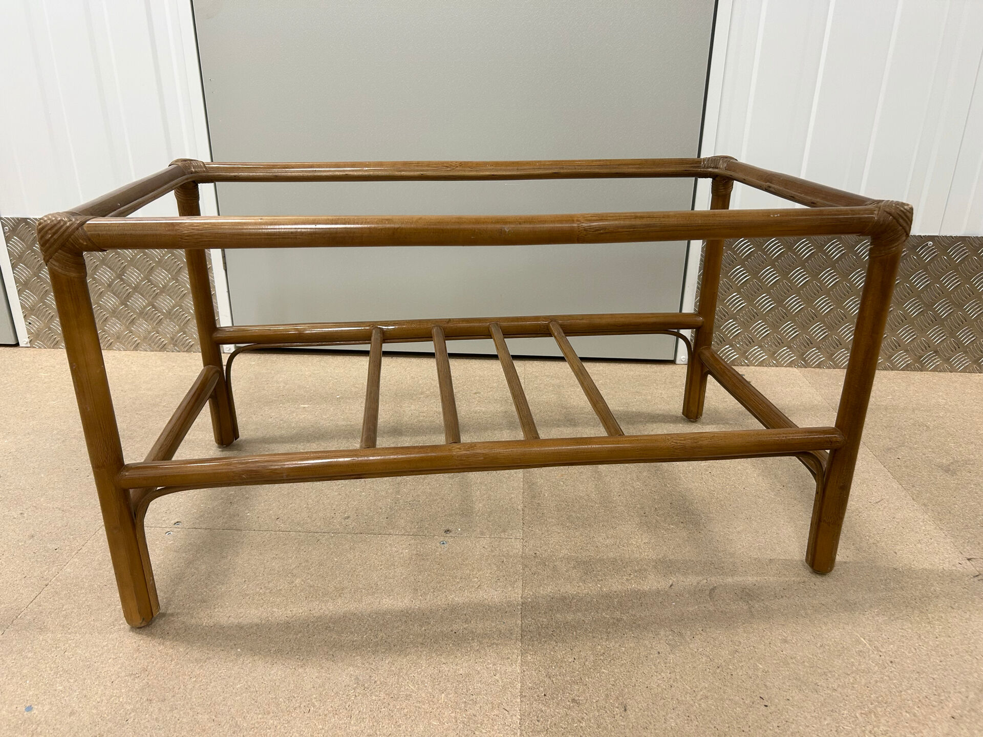 Vintage rattan coffee table (without glass) from the 1970s.