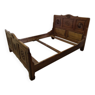 Carved wooden bed