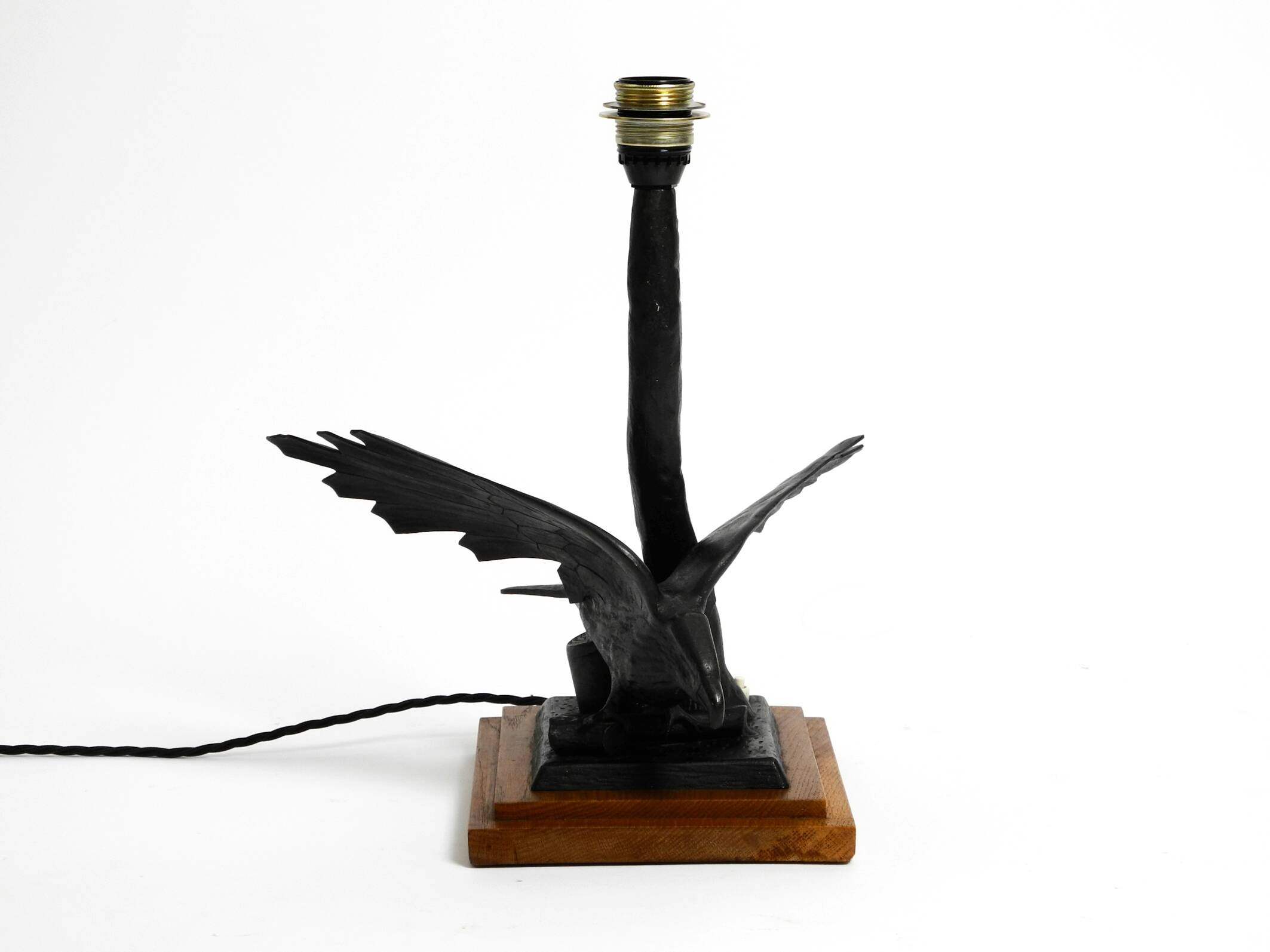1940s table lamp made of iron in the shape of an eagle, teak wooden base