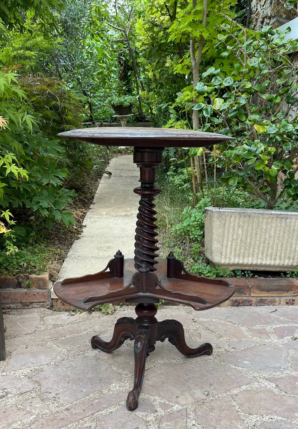 Old pedestal table with rotating trays
